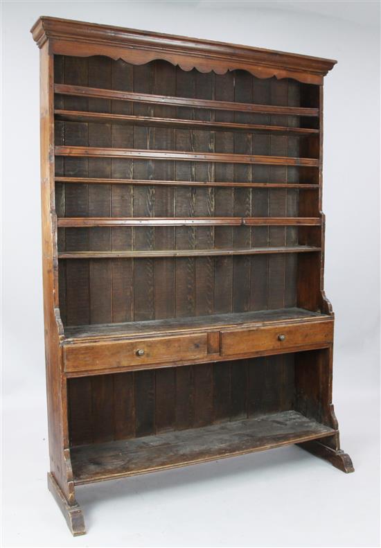 An 18th century pine dresser, W. 4ft 5in. D. 1ft. H. 6ft 4in.